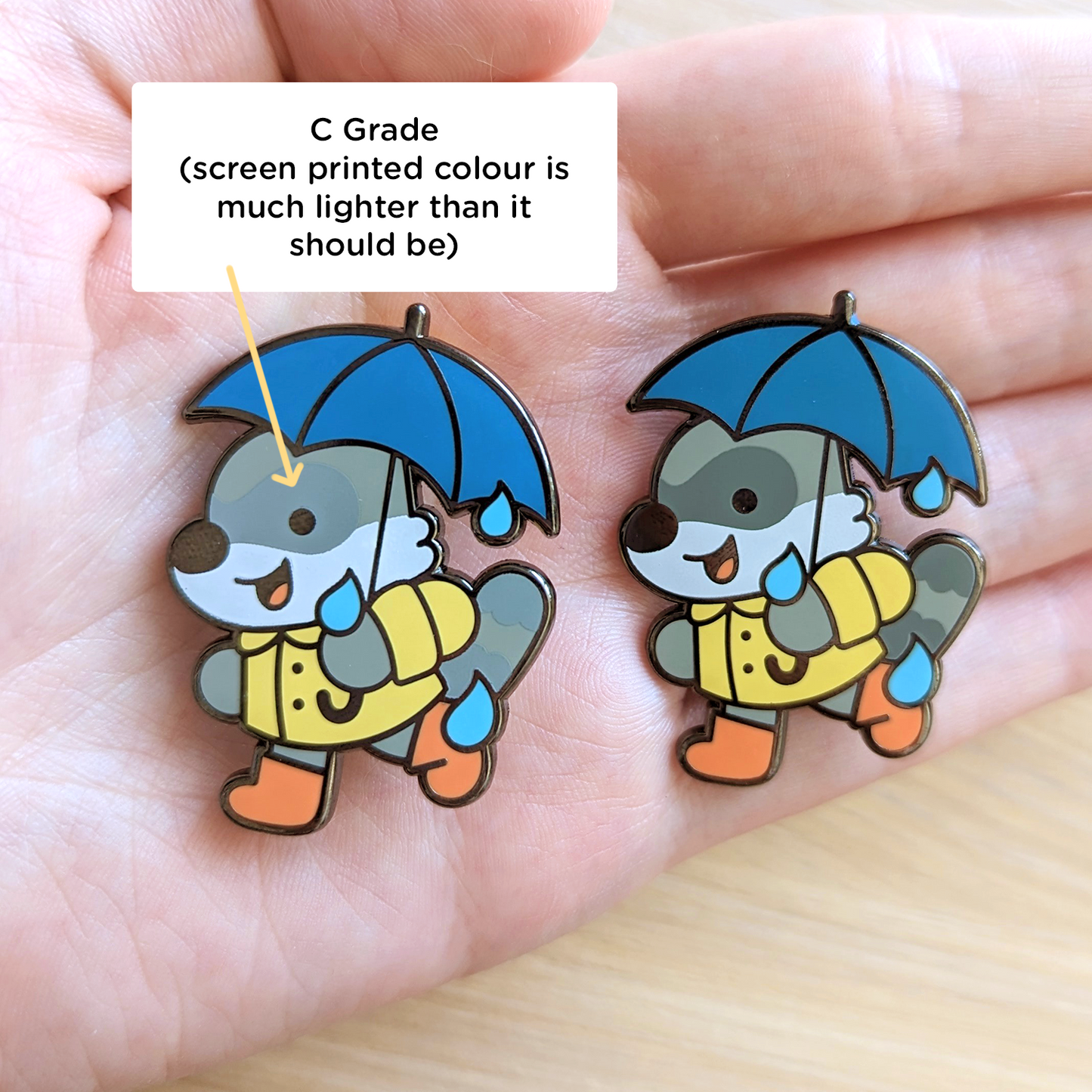 Rainy Raccoon Enamel Pin