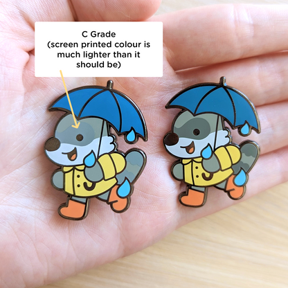 Rainy Raccoon Enamel Pin